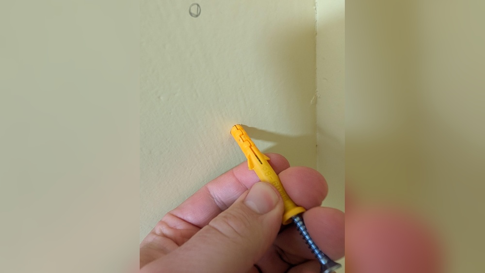 How Do I Put Plastic Anchors in the Wall