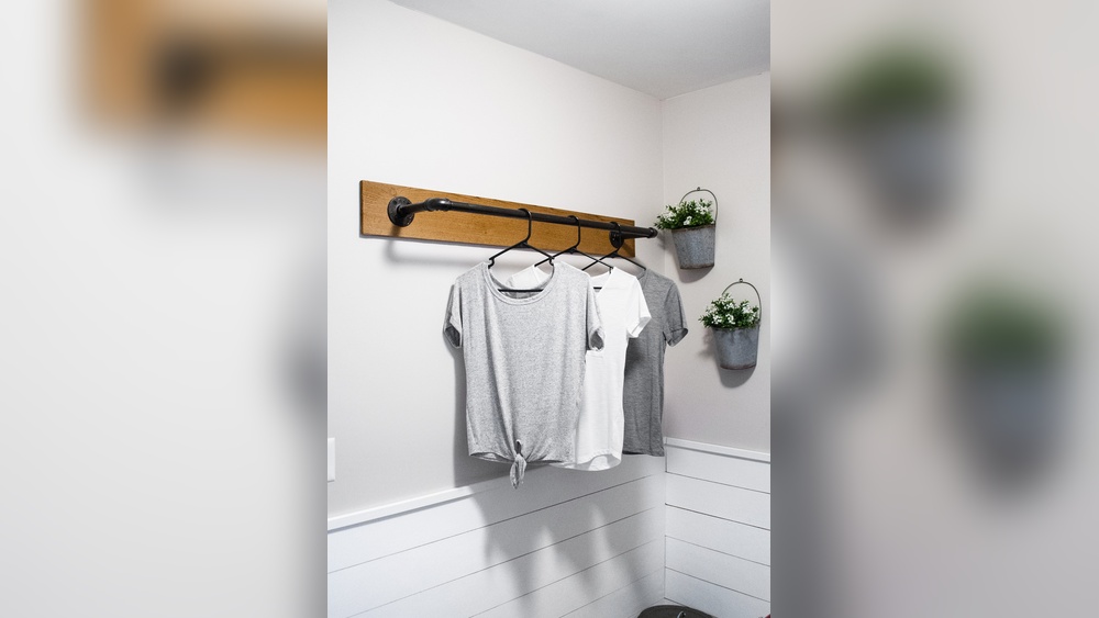 How to Anchor a Clothing Rod to a Brick Wall