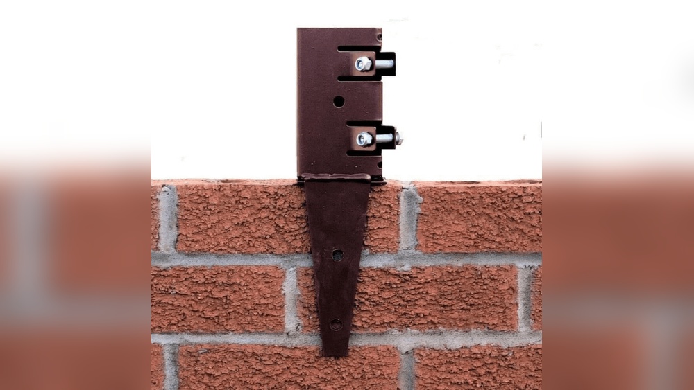 How to Anchor a Fence Post to a Wall