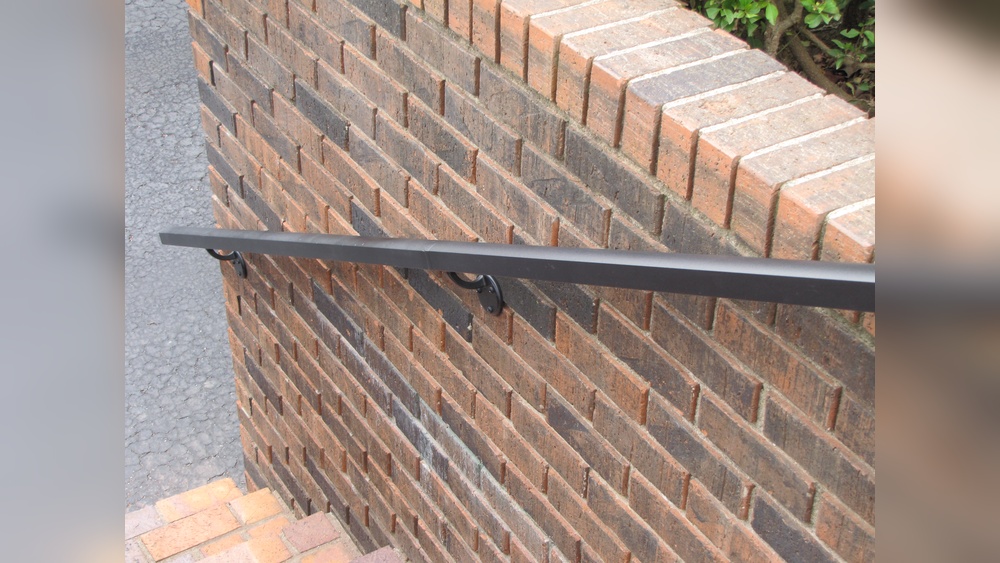 How to Anchor Railing to Brick Wall