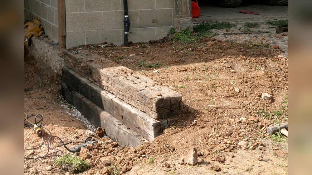 How to Anchor Railroad Ties for Retaining Wall