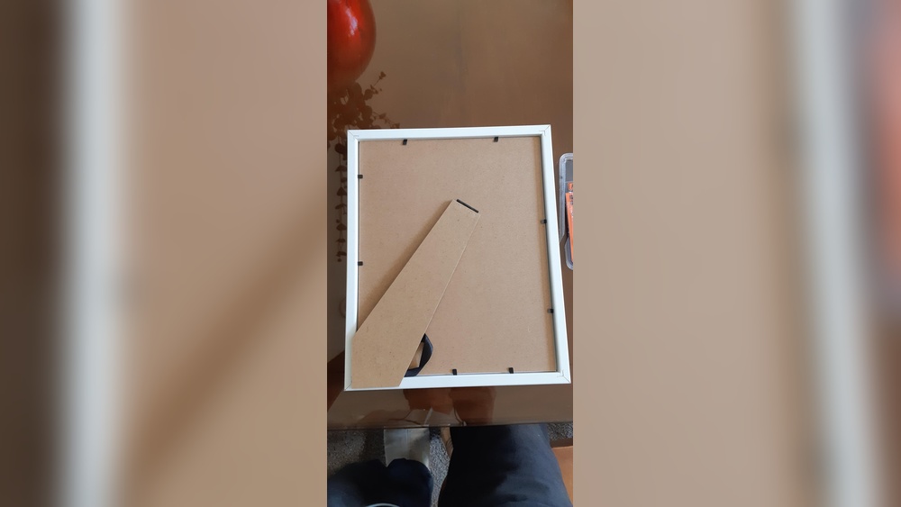 How to Hang Something Without Hooks on the Wall