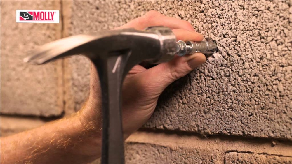 How to Install Anchor Bolts in a Brick Wall