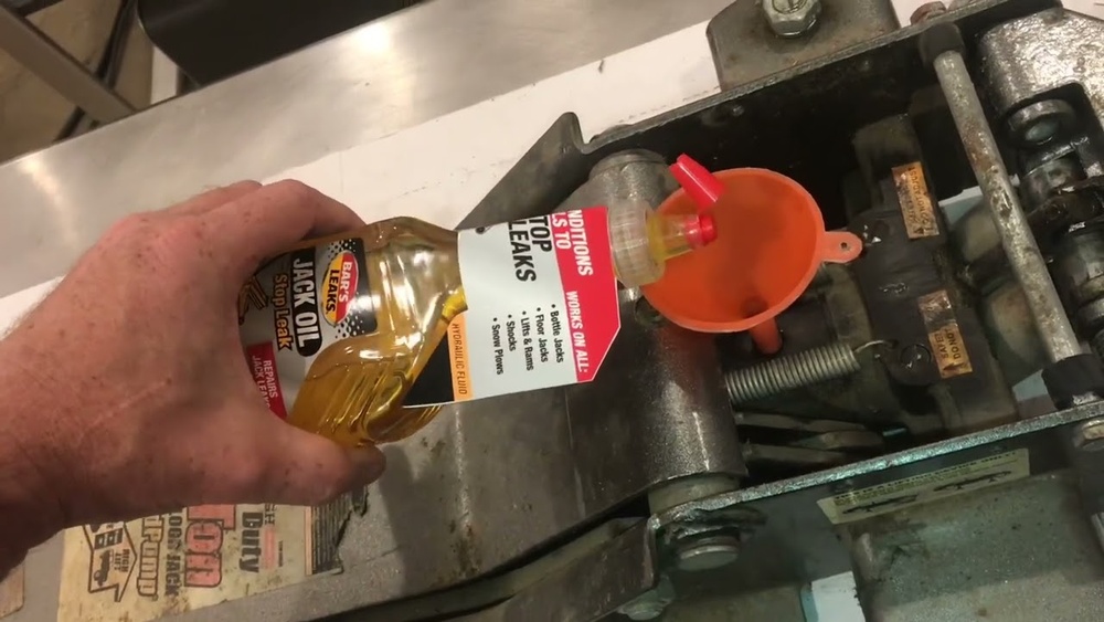 How to Put Hydrolic Oil in Floor Car Jack