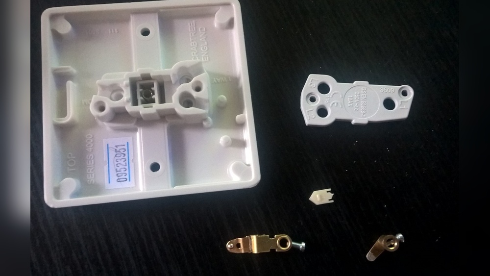 How to Put Light Switch Back Together