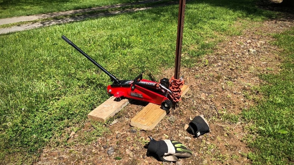 How to Use Floor Jack to Remove Fence Post